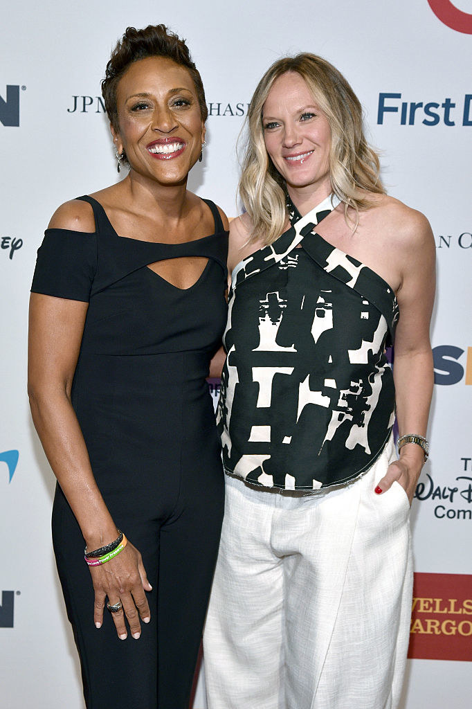 Robin Roberts and Amber Laign smiling together at an event