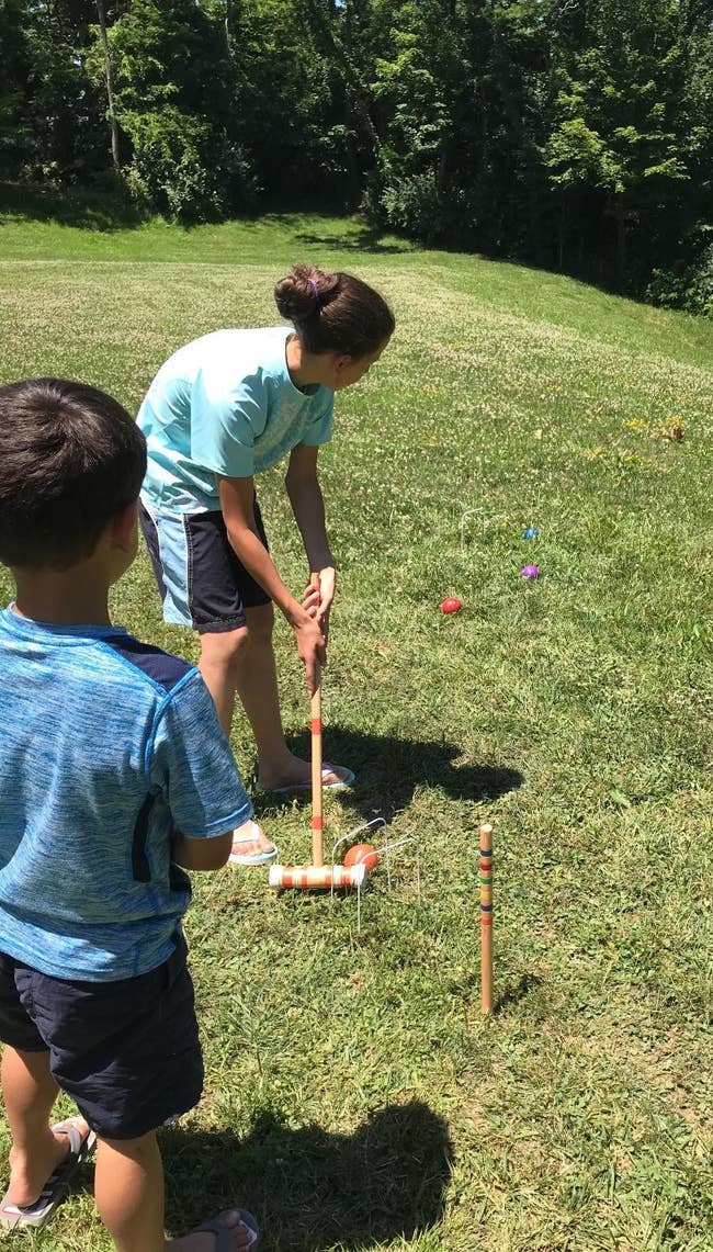 Reviewer's photo of family playing croquet