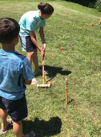 Reviewer's photo of family playing croquet