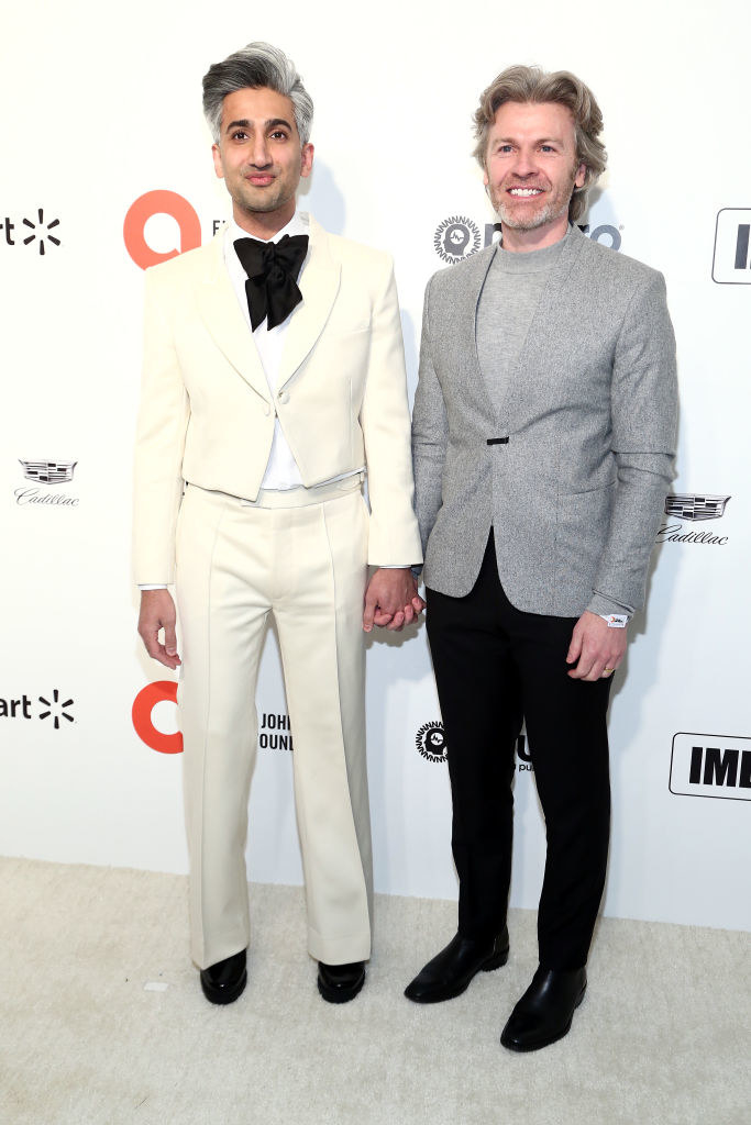 Tan and Rob France holding hands at an event