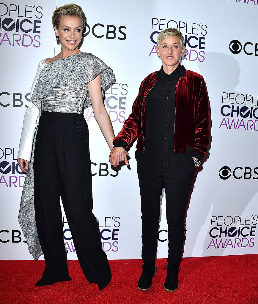 Portia and Ellen holding hands on the red carpet