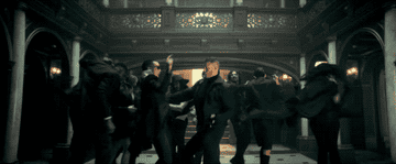 A gif of the cast dancing