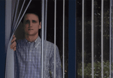 zach woods at the window looking out in &quot;silicon valley&quot;