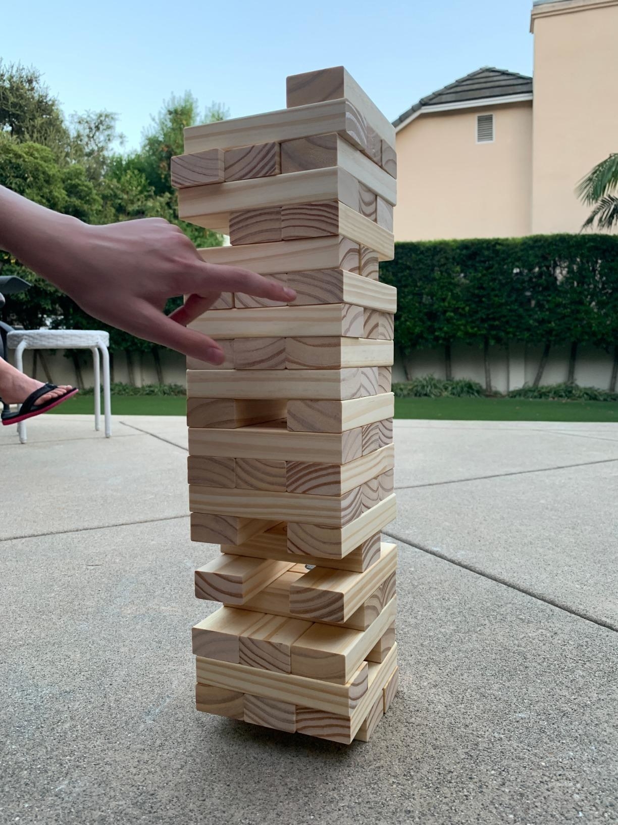 reviewer&#x27;s photo of the wooden stacking game