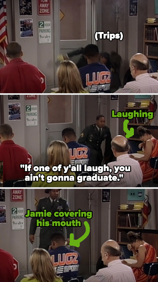 Jamie Foxx and a woman sitting next to him both are looking down at their desks to try to hide their laughs