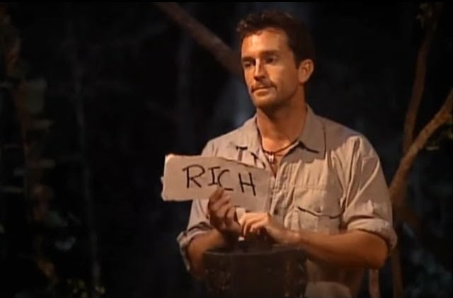 Jeff Probst holds a piece of paper that says &quot;Rich&quot;