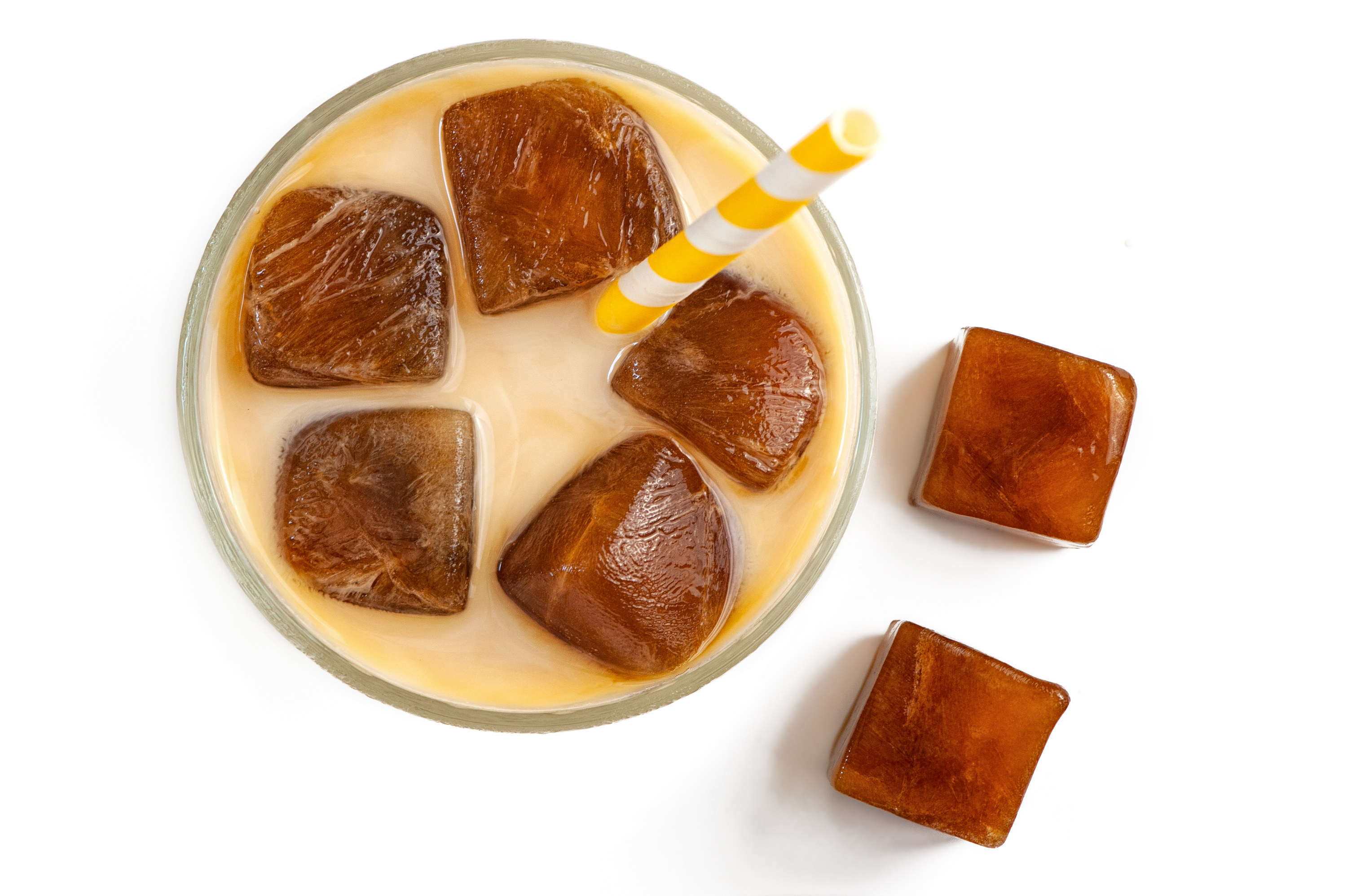 Ice cubes of coffee in a coffee glass