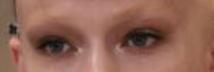 A close-up of one of the sister&#x27;s eyes, with eyebrows bleached to the point they&#x27;re hard to see