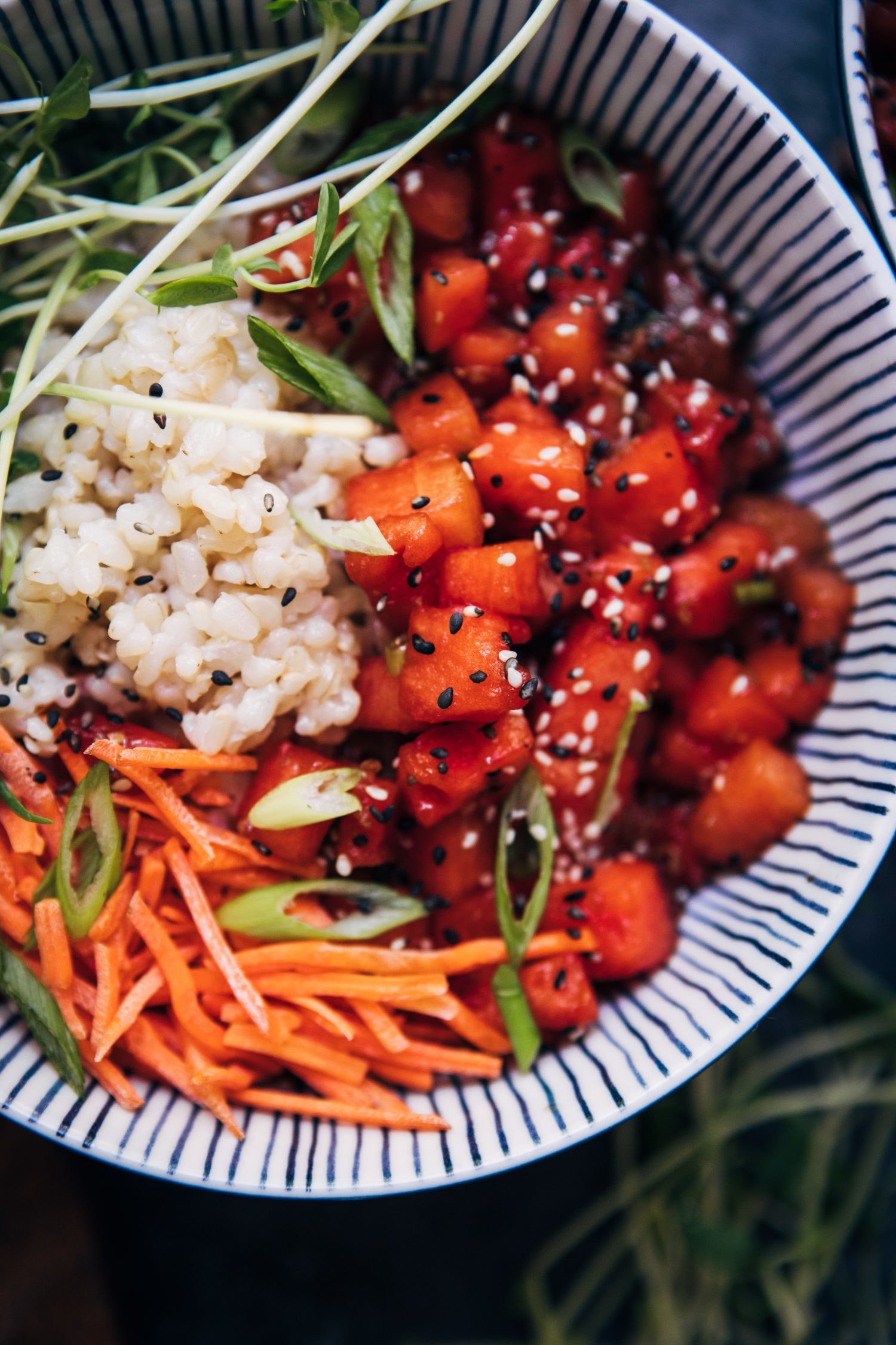 Watermelon poke bowls with rice and vegetables.