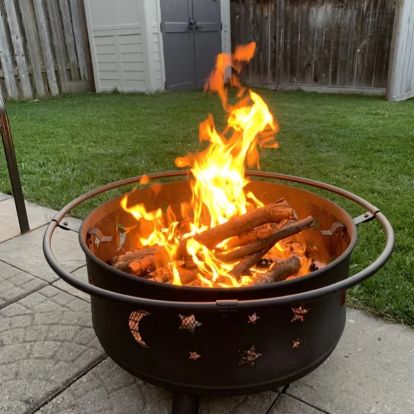 the fire pit with a fire in it
