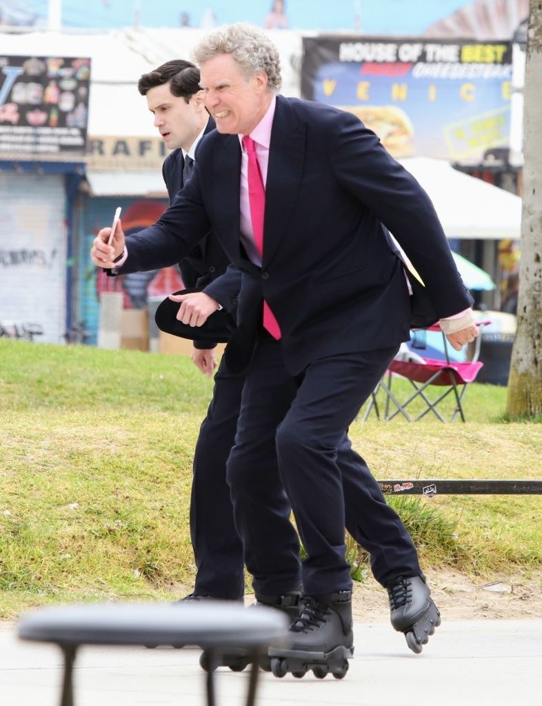 Will Ferrell looking very angry while rollerblading