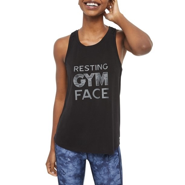 model wearing the tank that says resting gym face