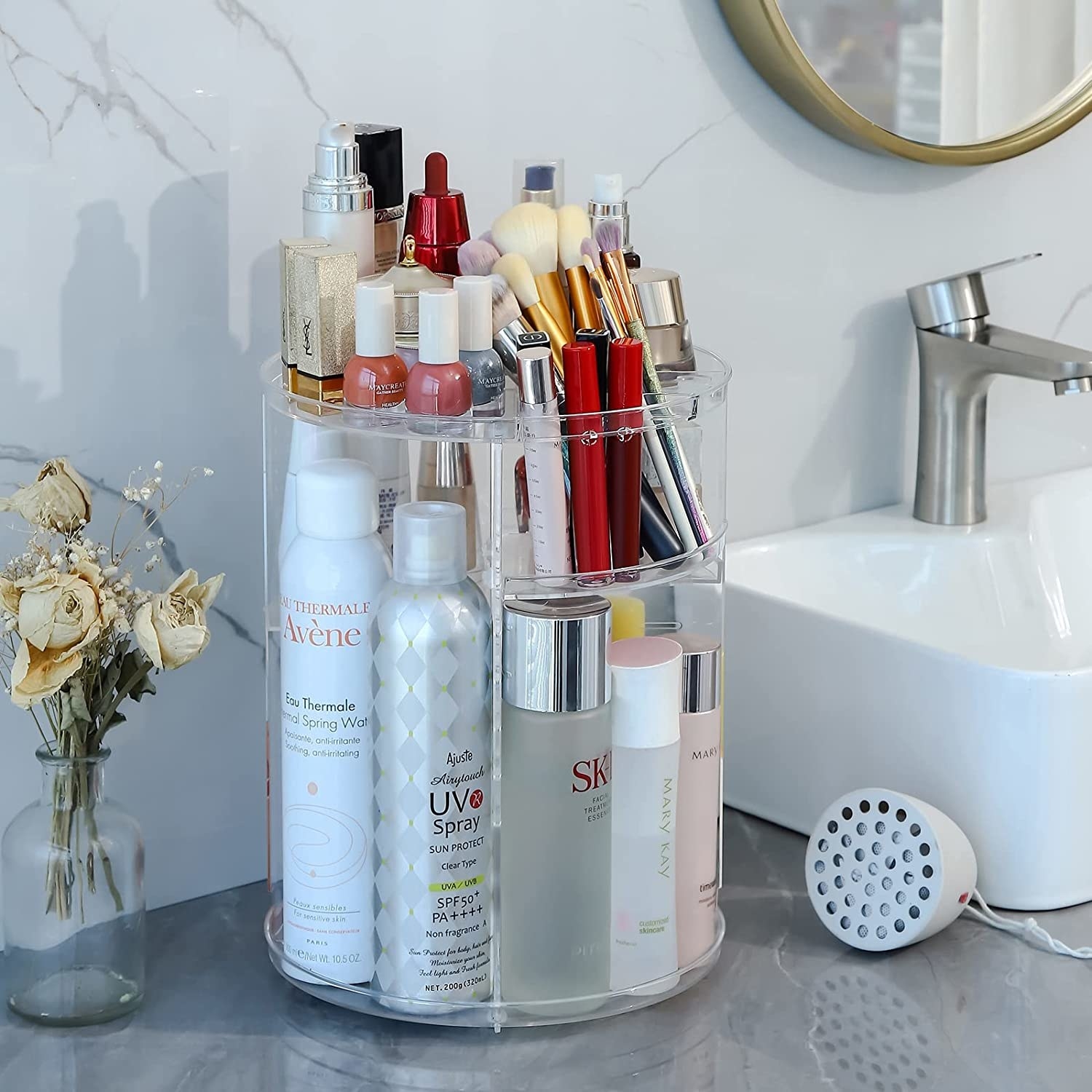 the organizer full of products on a bathroom counter