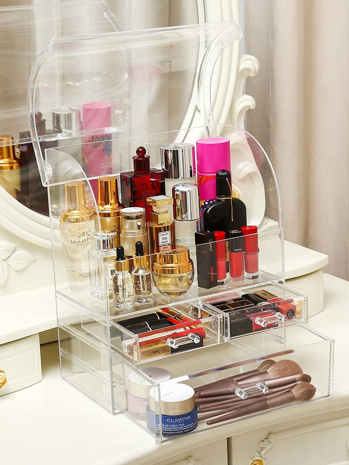 the clear container filled with beauty products