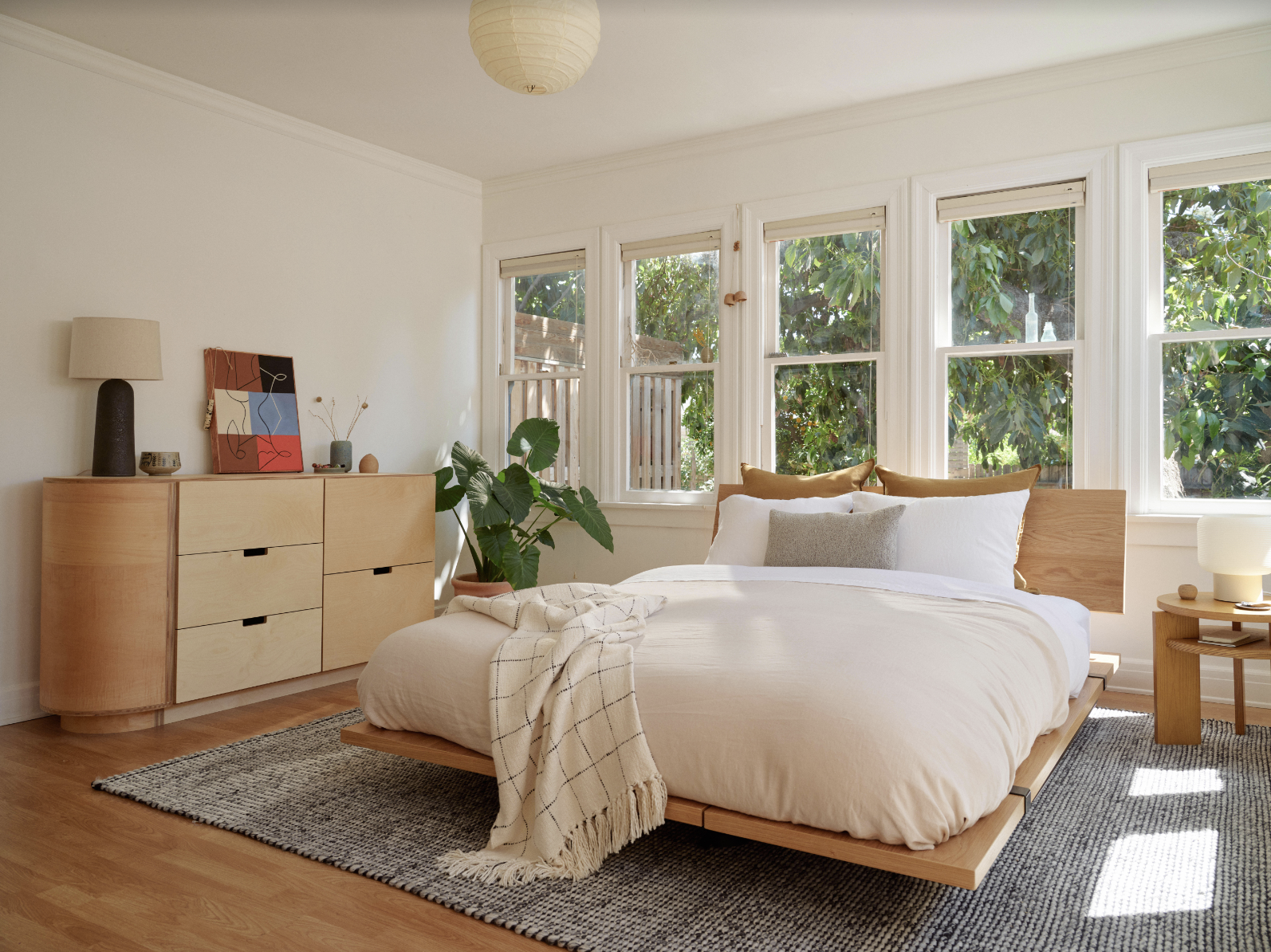 A beautifully designed bedroom is shown