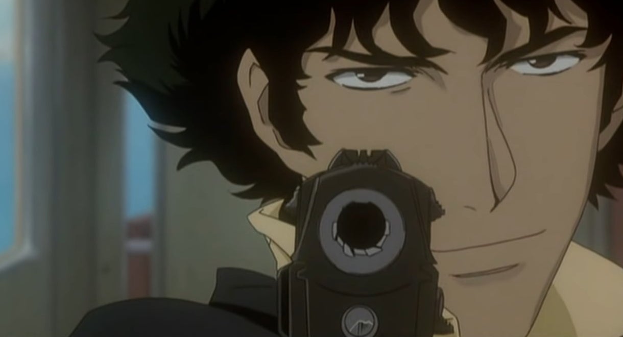 Close-up of Spike pointing a gun at the screen in &quot;Cowboy Bebop&quot;