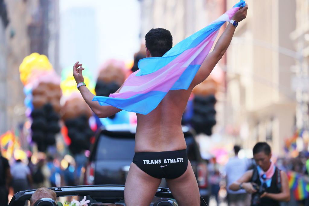 trans athlete with the trans flag