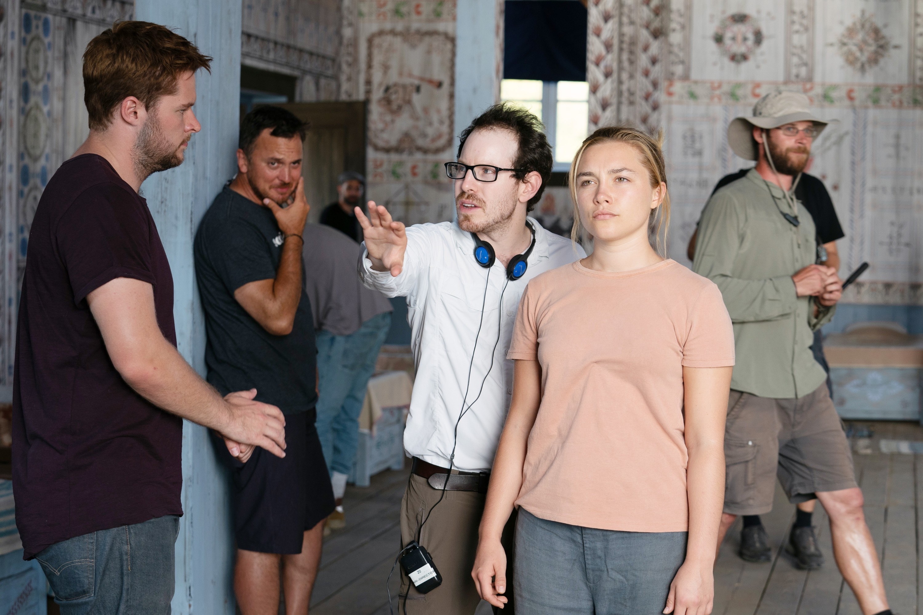 Jack Reynor, director Ari Aster, and Florence Pugh on the set of Midsommar