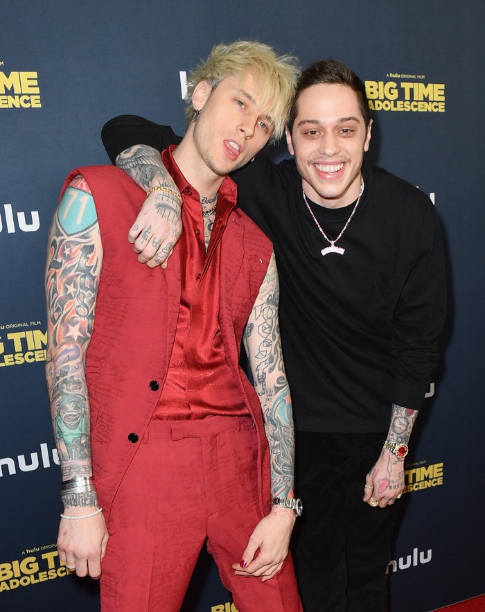 Pete with his arm around MGK at a red carpet