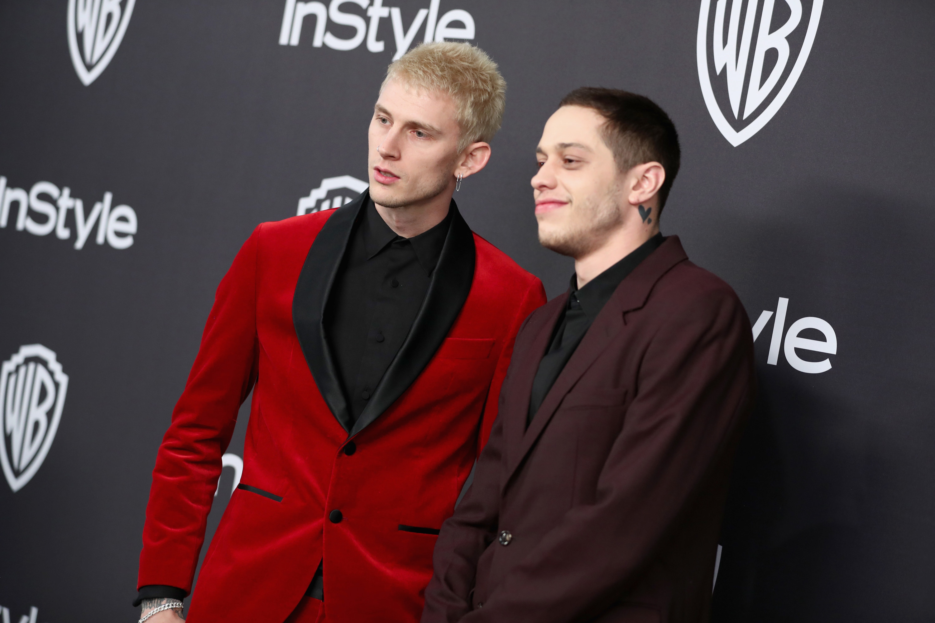 Pete and MGK smizing on the red carpet