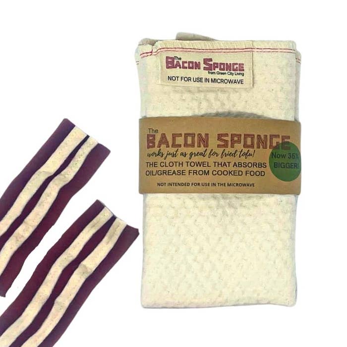 An image of a white sponge with brown, red, black and green label and a red and white fabric on the side