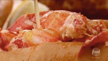Butter sauce being poured on lobster