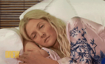 Scene from 50 First Dates with a VHS tape &quot;Good morning, Lucy&quot; being put into the VCR