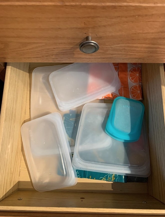 A reviewer collection of white and orange storage bags