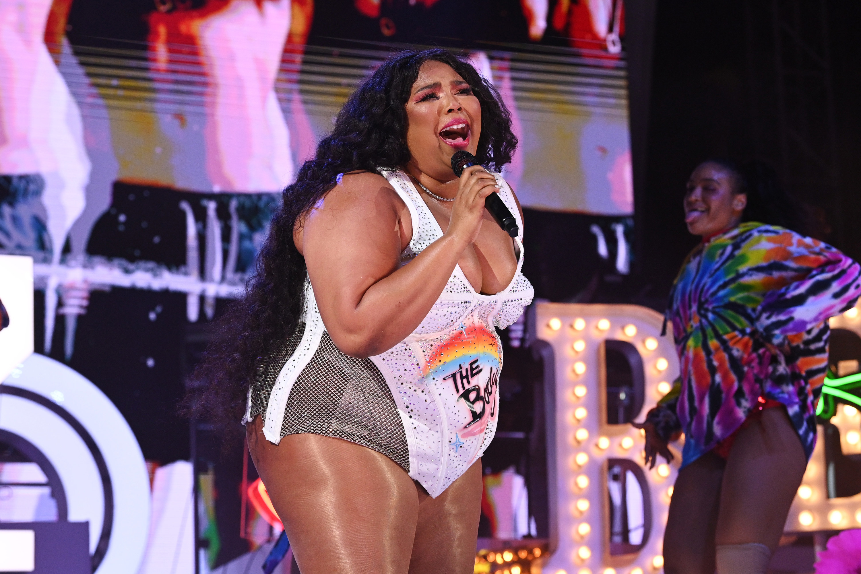 Lizzo singing on stage