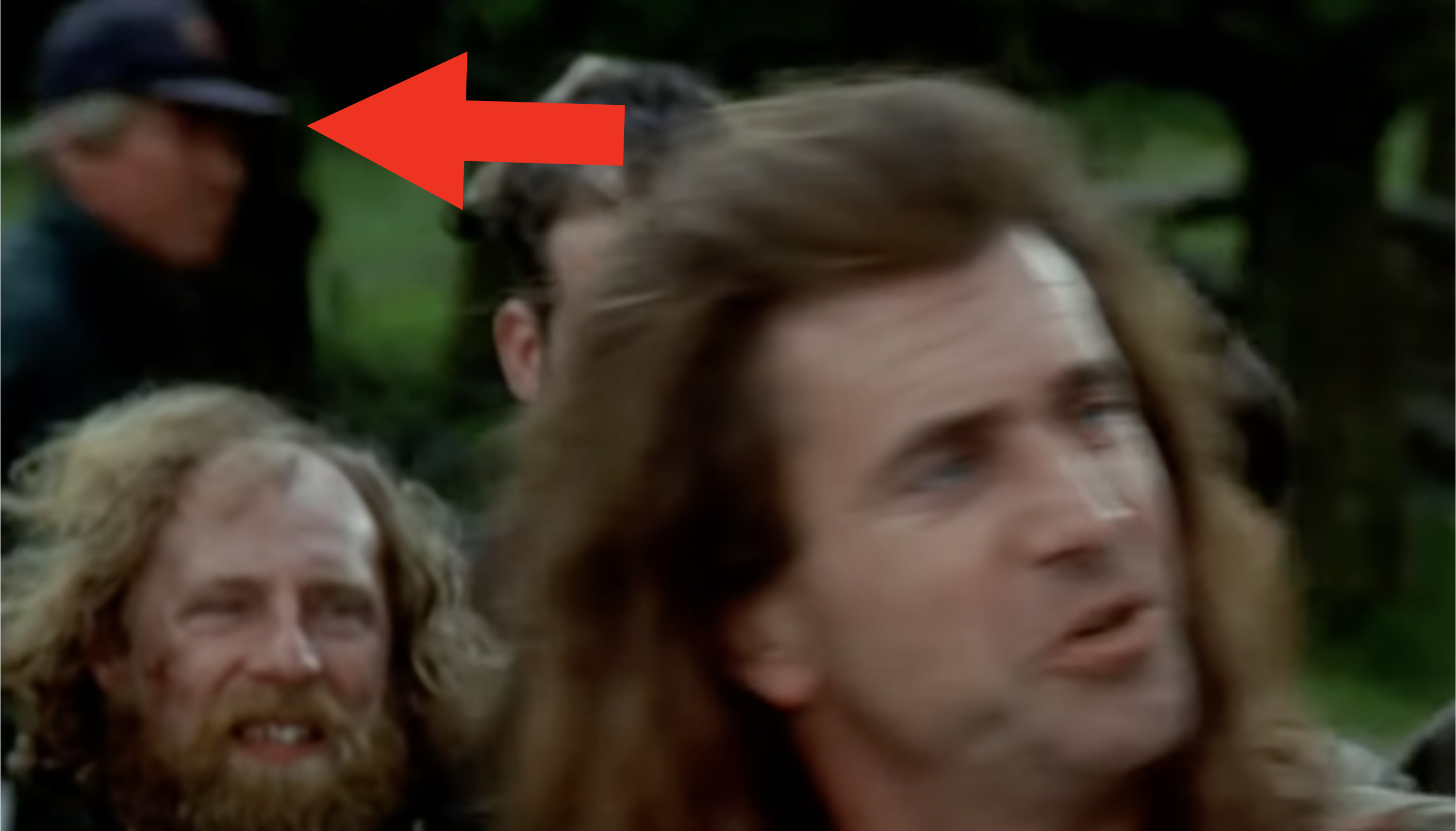 A closer shot of the man in a baseball cap in a &quot;Braveheart&quot; scene
