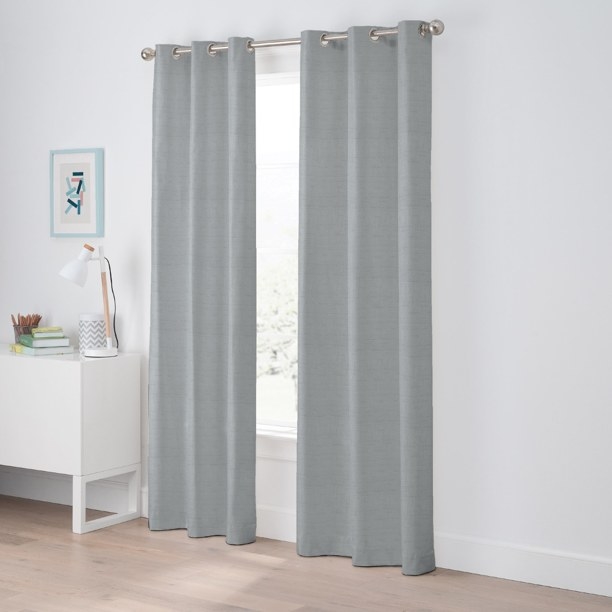 The curtain panels in the color Gray