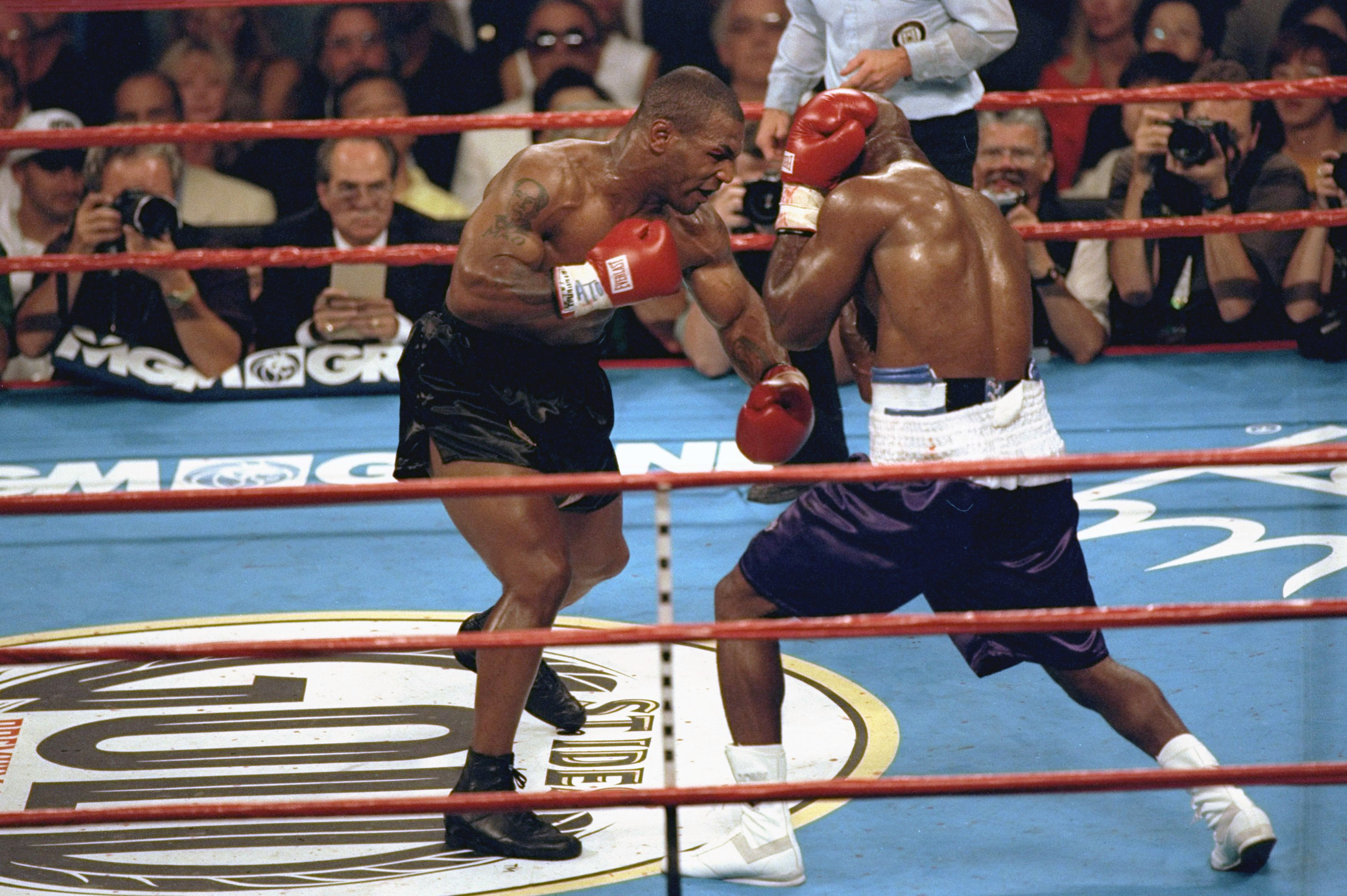 Mike Tyson and Evander Holyfield fighting at MGM Grand in Las Vegas in June 1997