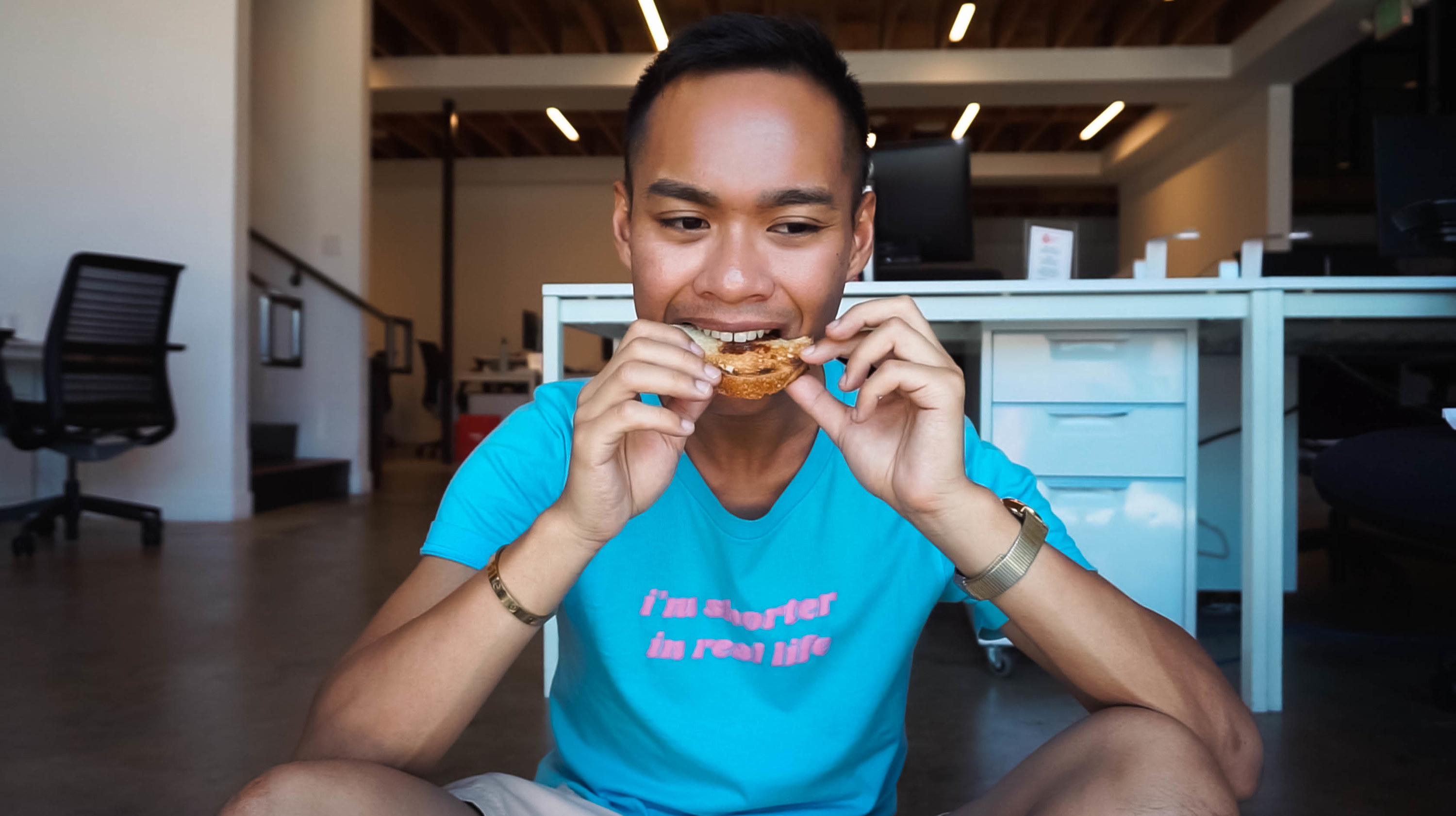 Author biting into the piece of toast