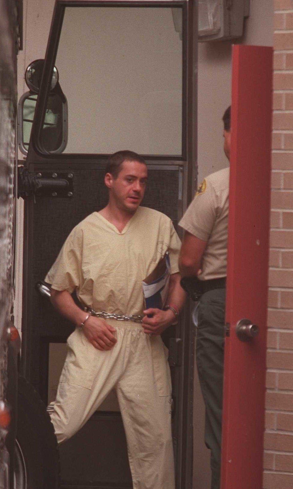 Robert Downey Jr arrives for a bail hearing in July 1996