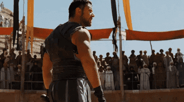 Russell Crowe dressed as a gladiator saying &quot;are you not entertained&quot;