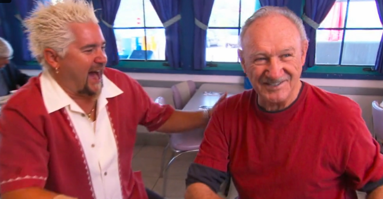 Guy sitting next to Gene in a restaurant