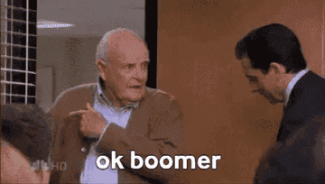 A man closing a door on an older man with the text, &quot;OK, boomer&quot;