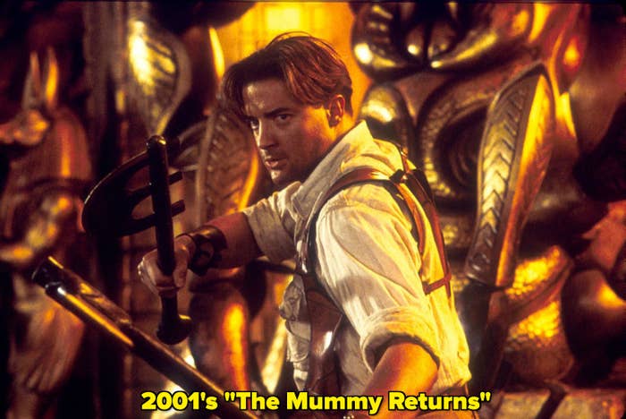 A screenshot of Fraser holding weapons in &quot;The Mummy Returns&quot;