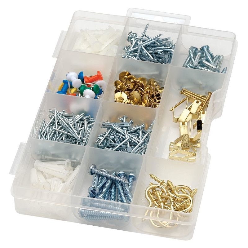 the tackle box full of various utility supplies