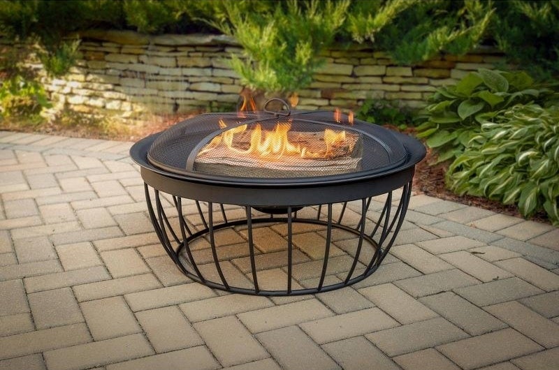 the fire pit burning wood