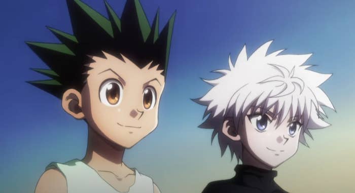 Gon and Killua standing next to each other