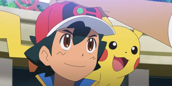 Ash with Pikachu standing on his shoulder