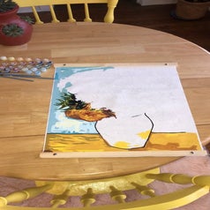 An unfinished painting of a flower vase