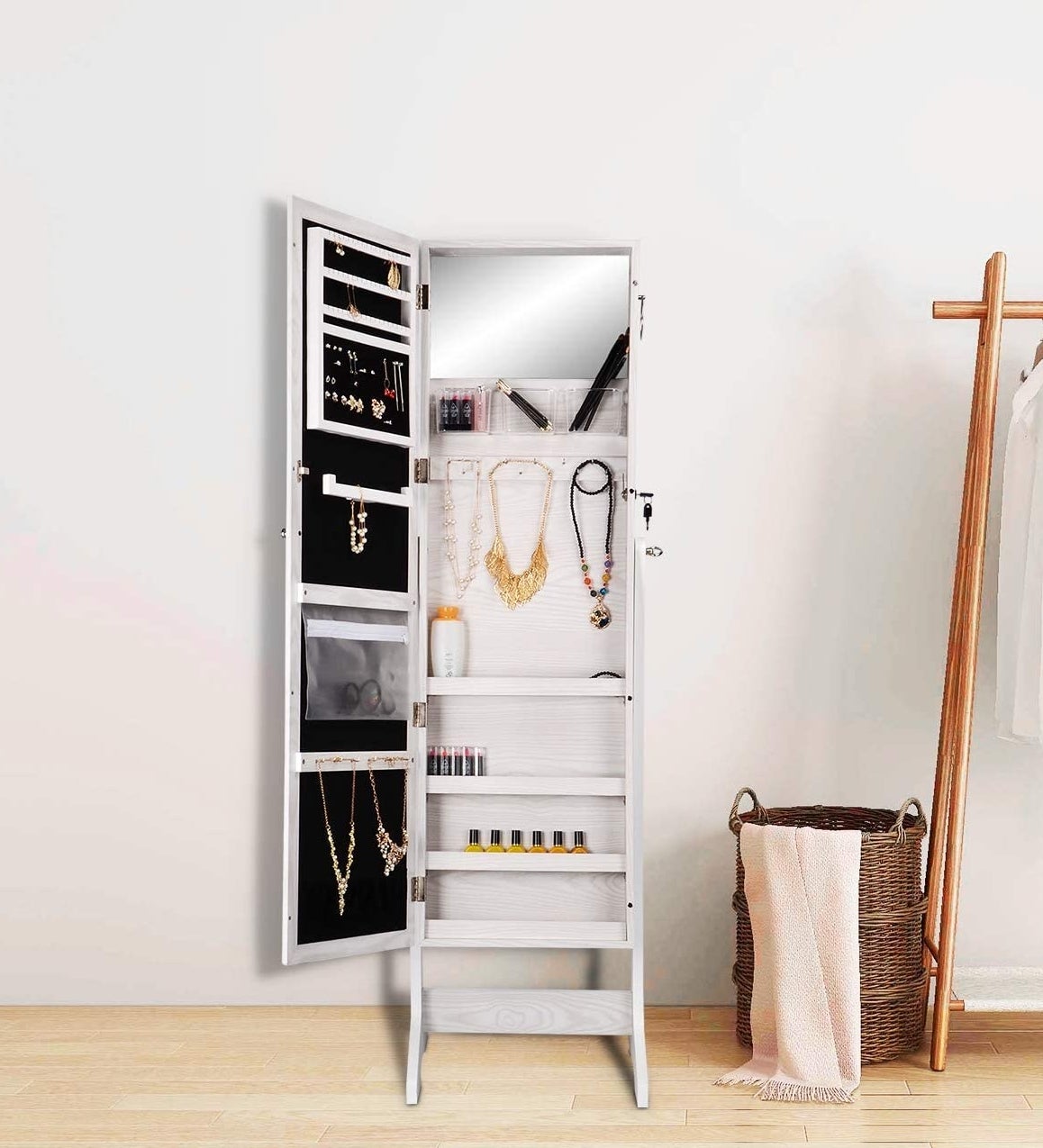 a stylish mirror opened to show its inner shelves and storage space
