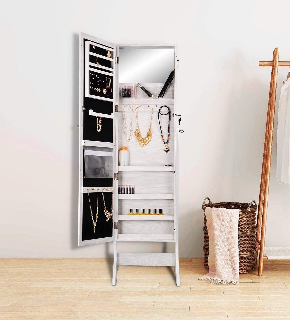 a stylish mirror opened to show its inner shelves and storage space