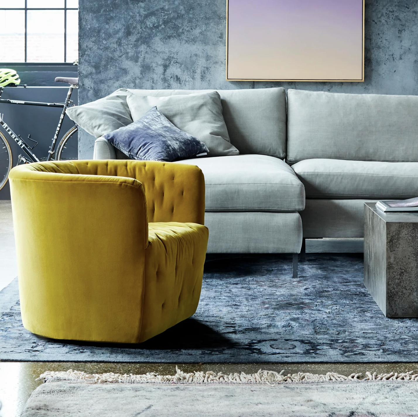 A mustard yellow accent chair is shown in a living room