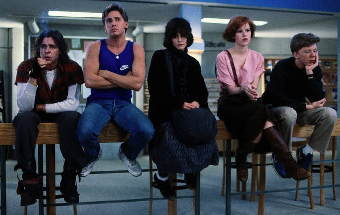 the characters sitting down in the library