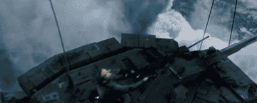 man shoots from a tank in the sky