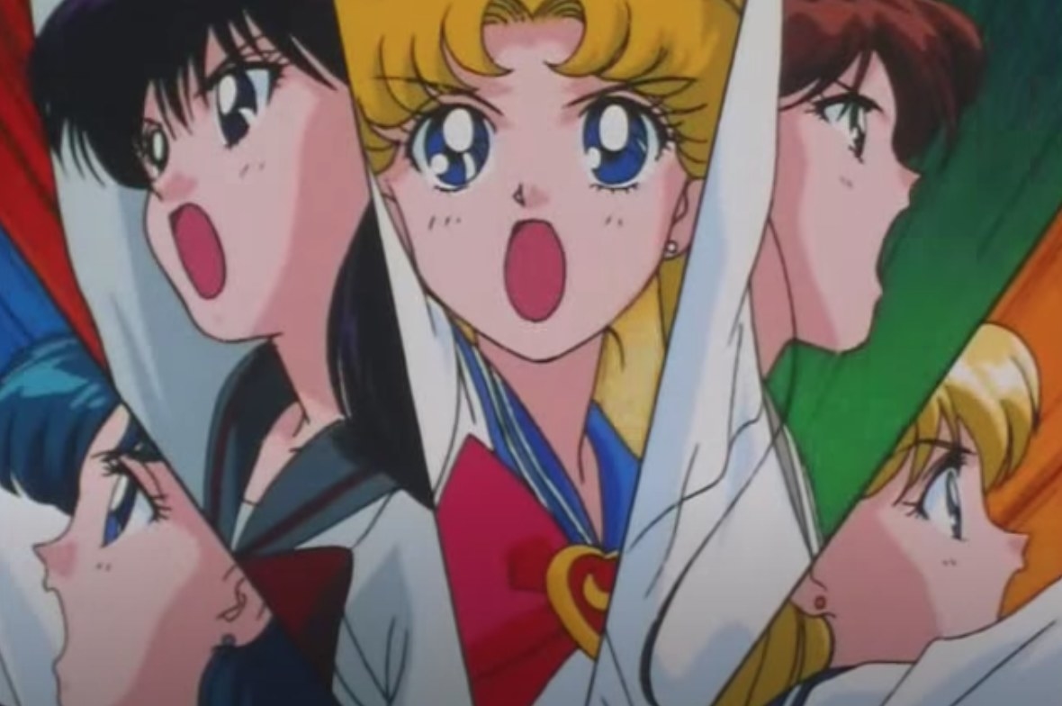 The Sailor Scouts from Sailor Moon using their powers