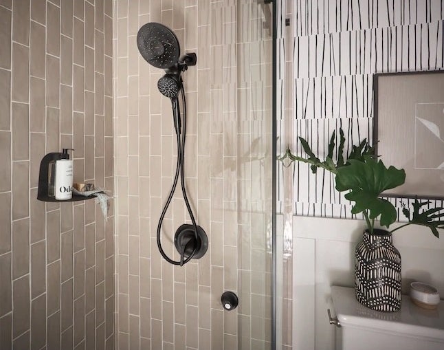 a matte black shower head in a shower